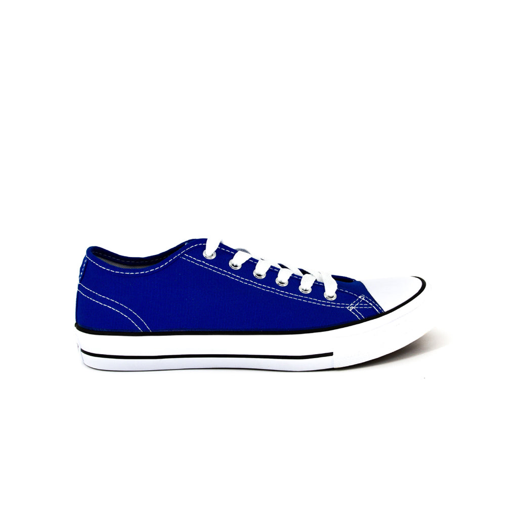 รองเท้าผ้าใบแฟชั่น รุ่น 1207 สีน้ำเงิน โชว์หน้าผ้าแคนวาสและเส้นคาดขอบยางสุดคลาสสิก มุมมองด้านข้าง